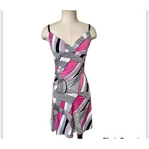 Have pink black and white sleeveless dress